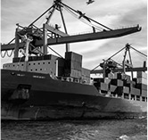 Cargo Ship with containers and lifting cranes