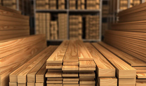 warehouse stacked with wooden planks